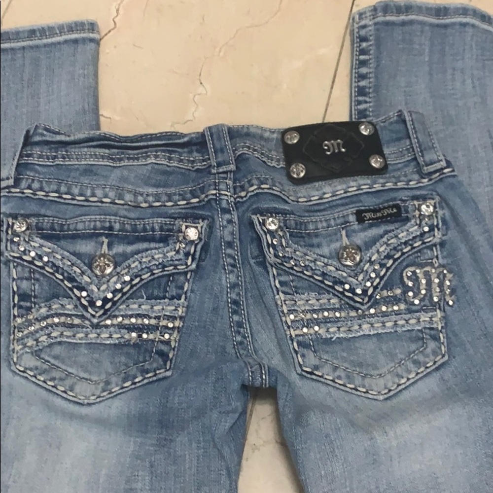 Miss Me Buckle Boot Jeans